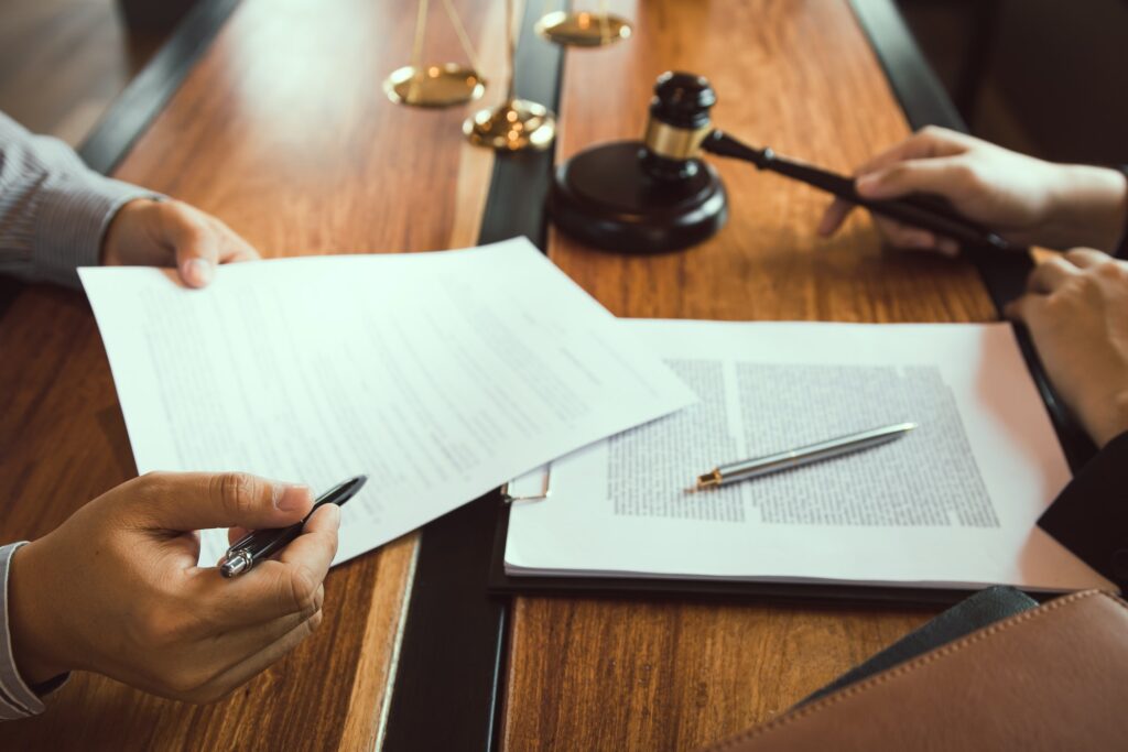 client is bringing the documents to clarify the law to the lawyer at the prosecutor office
